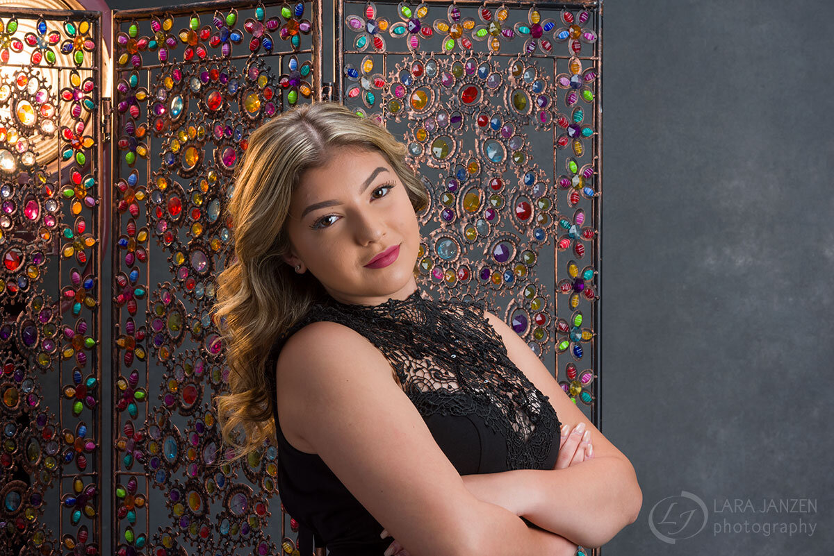 Colorful backdrop with a beautiful young woman