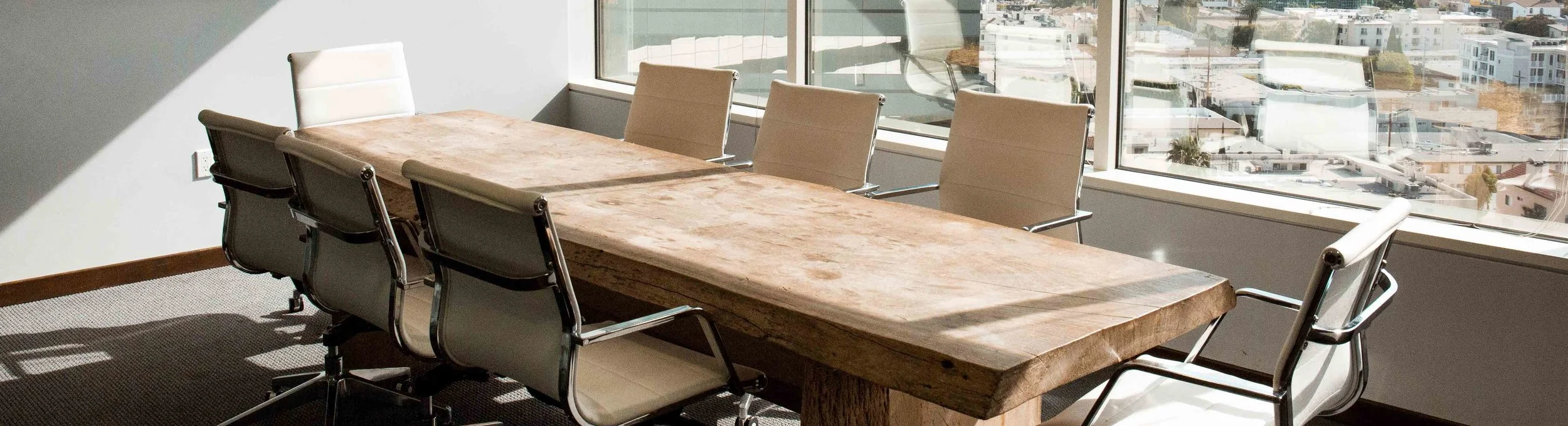 Banner-Tan board room.jpg