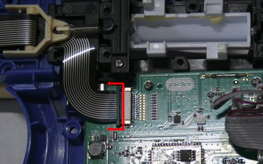 Slide the black locking bar just a bit to 'unlock' the connector and detach the ribbon cable.