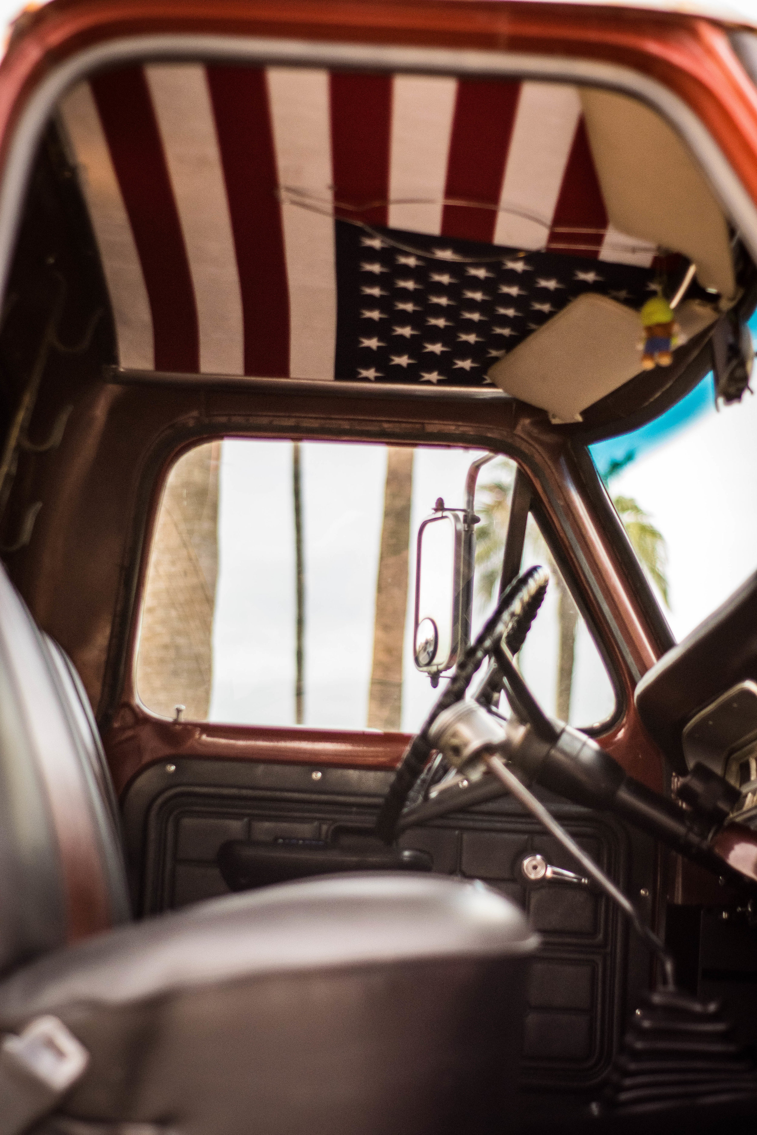  When insulating the cab, I decided to put Dynamatt on the roof as well. While the headliner was out I thought, why not put old glory up there too.  