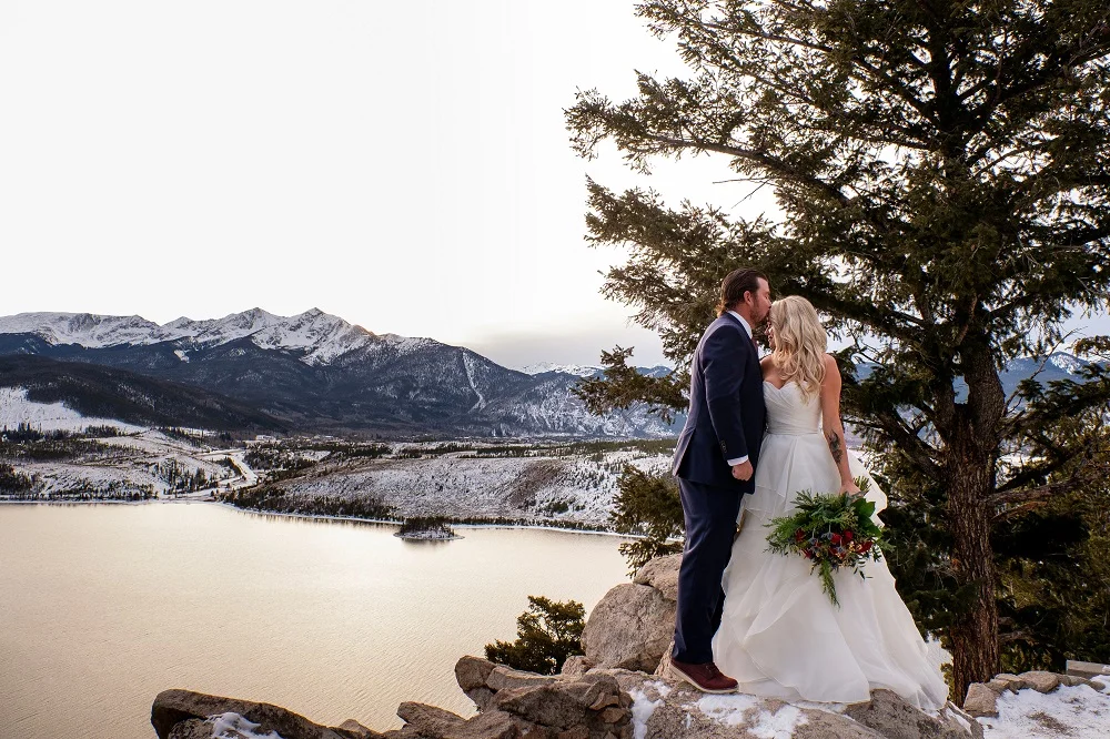 Solo flute wedding ceremony music at sapphire point in Dillon, Colorado, photo by Ian Riley