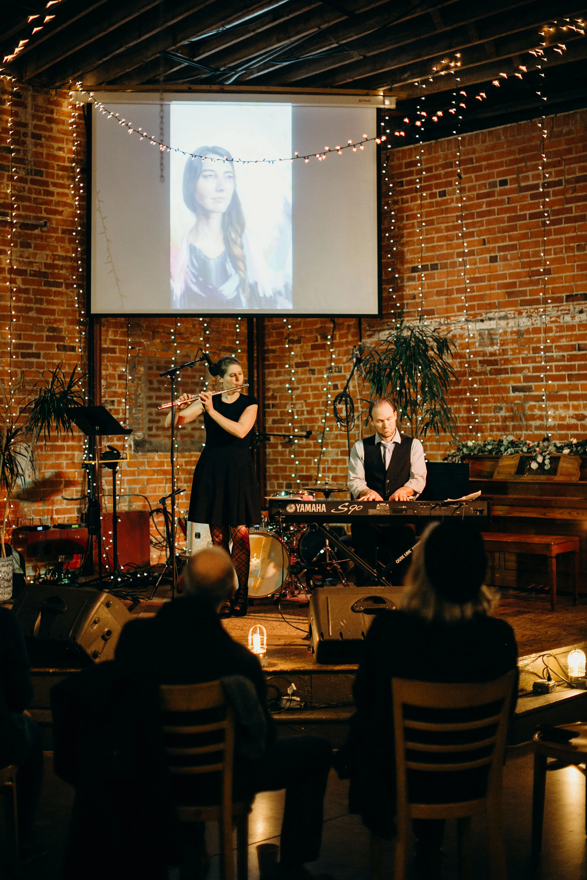 inspire duo performs for an art opening at the bolt Gallery in Fort collins, colorado photo courtesy of Crista tppmann photography