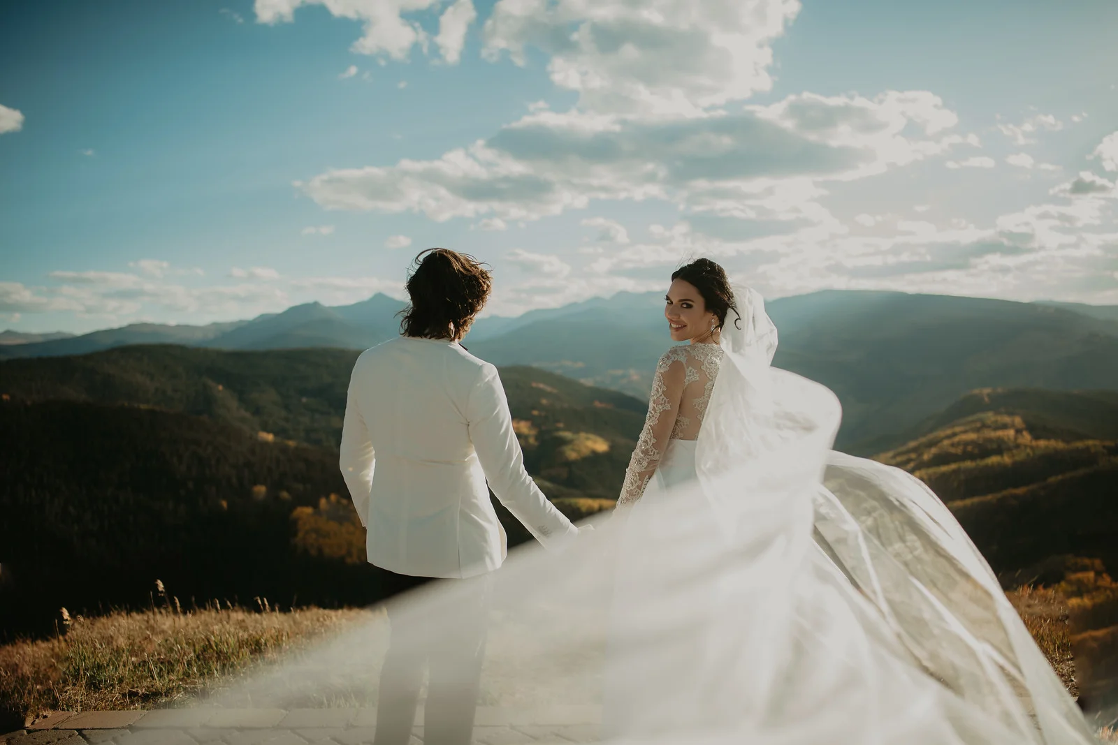 Flute and cello rap and popular wedding ceremony music at the holy cross event deck in vail, colorado, Photo by back country imagery