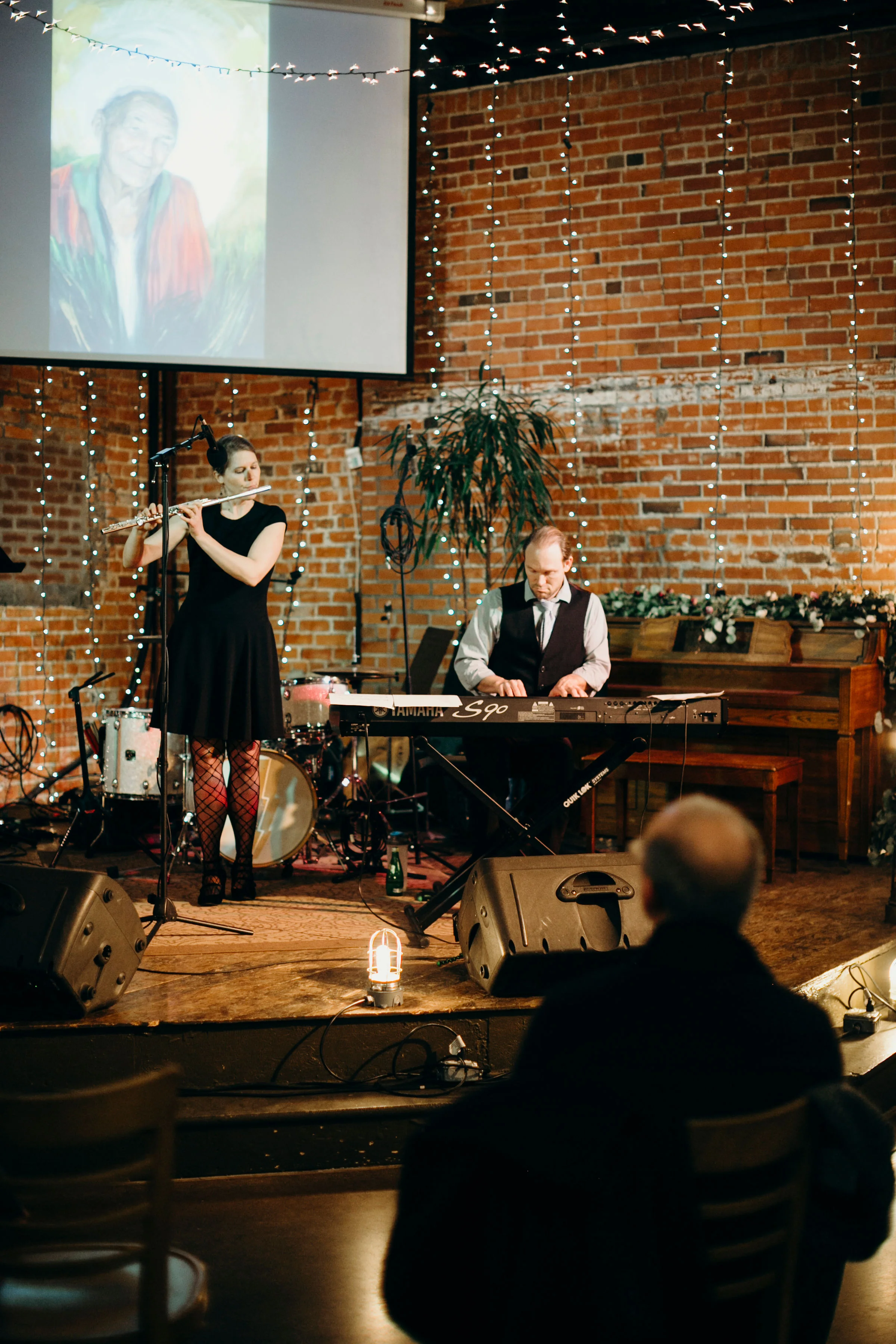inspire duo performs for an art opening at the bolt Gallery in Fort collins, colorado photo courtesy of Crista tppmann photography