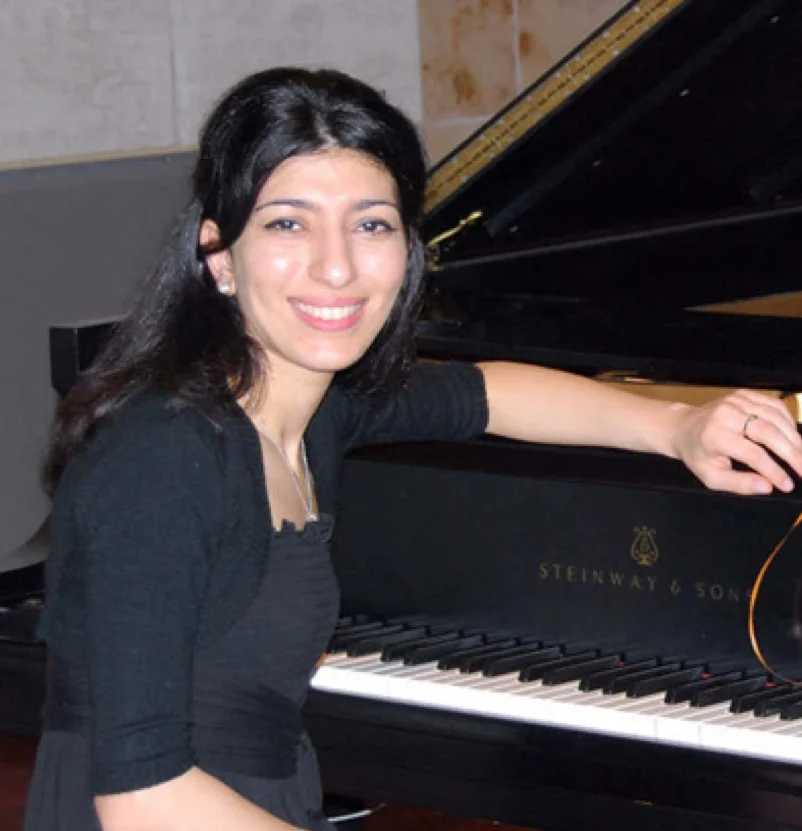 Elena Akopova: Assyrian pianist Elena Akopova, received her Master’s Degree at San Francisco Conservatory of Music. She graduated from SFCM in 2009 with honors and special awards, majoring in solo piano performance and chamber music. Soon she established herself in the Bay Area as an accompanist, a chamber music collaborator, and a private piano/music theory teacher. Ms. Akopova received many awards in her native Russia and Europe, such as Astrakhan National Piano Competition, Sochi Chamber Music Competition, International Competition of Young Performers in Jyväskylä, Finland and others. Ms. Akopova is an active member of the Palo Alto Branch of the Music Teachers Association of California. Currently she is the Chair of the Autumn Festival – an annual musical event, created to motivate and inspire talented youth of the Bay Area, CA. Ms. Akopova enjoys teaching piano and owns a piano studio in Sunnyvale, CA. In addition, she is a faculty member of the Pacific Music Academy in San Jose, CA. Every year many of her students receive top awards at musical contests such as United States Open Music Competition, Music Legacy Open Competition and others. As a performer, Elena has been recognized for her beautiful, singing piano tone, unique musical interpretation and artistic charisma.