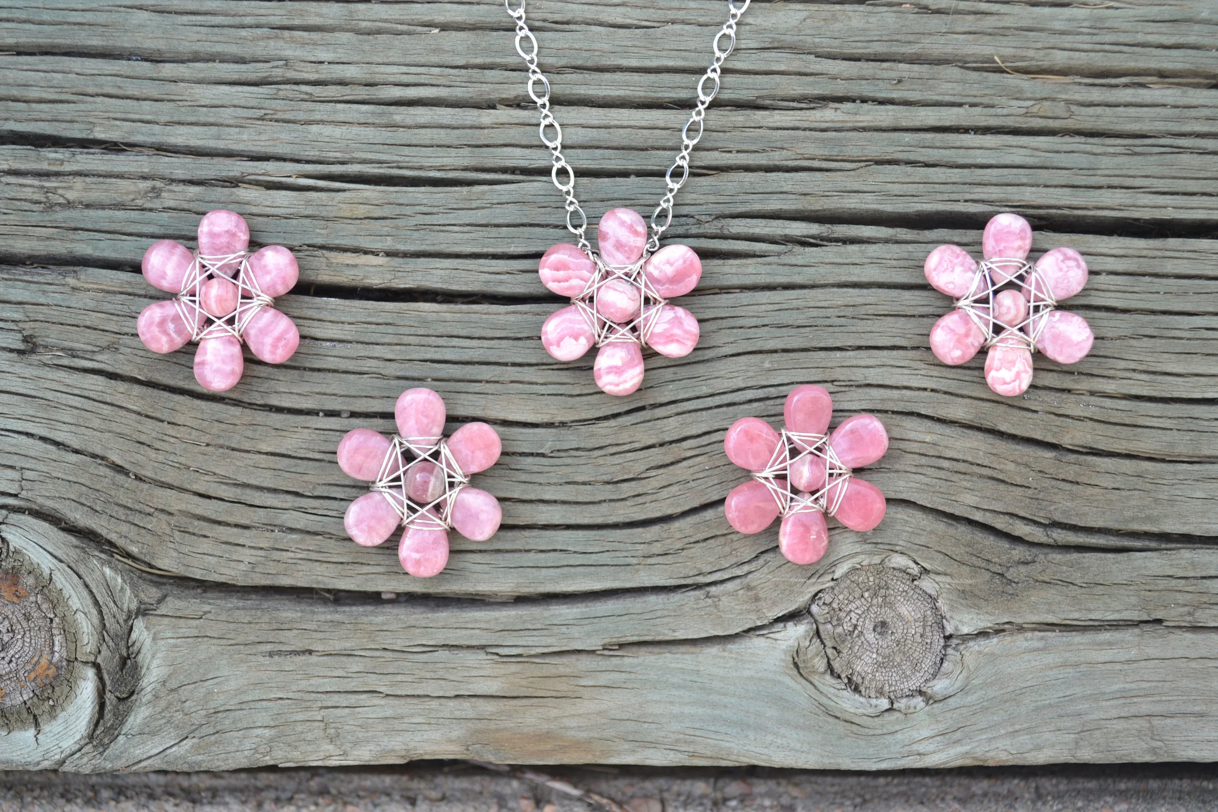 rhodo petals on wood.jpg