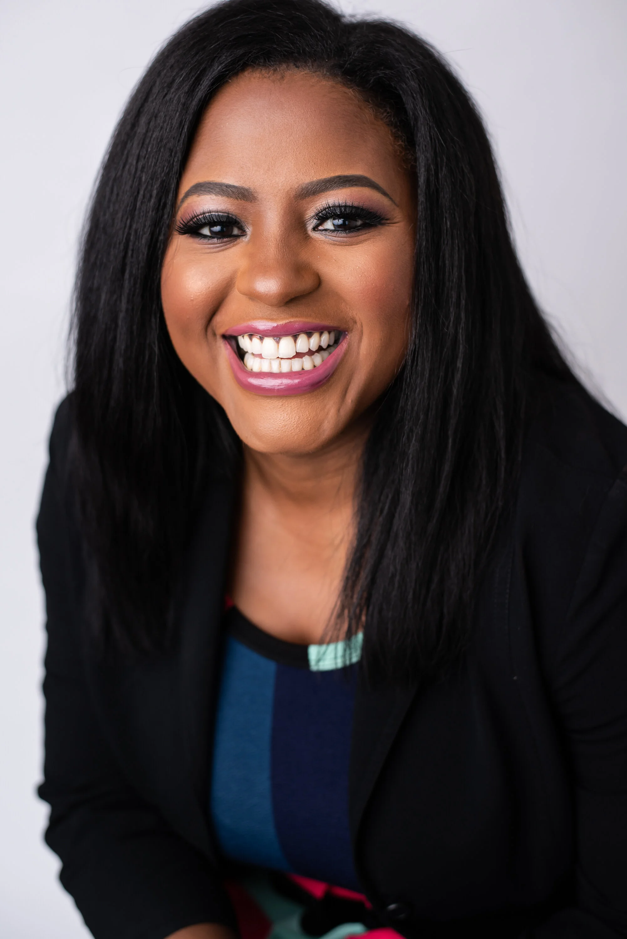  Amanda Anderson is a talented portrait photographer based in Charlotte, NC capturing clients like Simone McDowell in her Dilworth studio.  