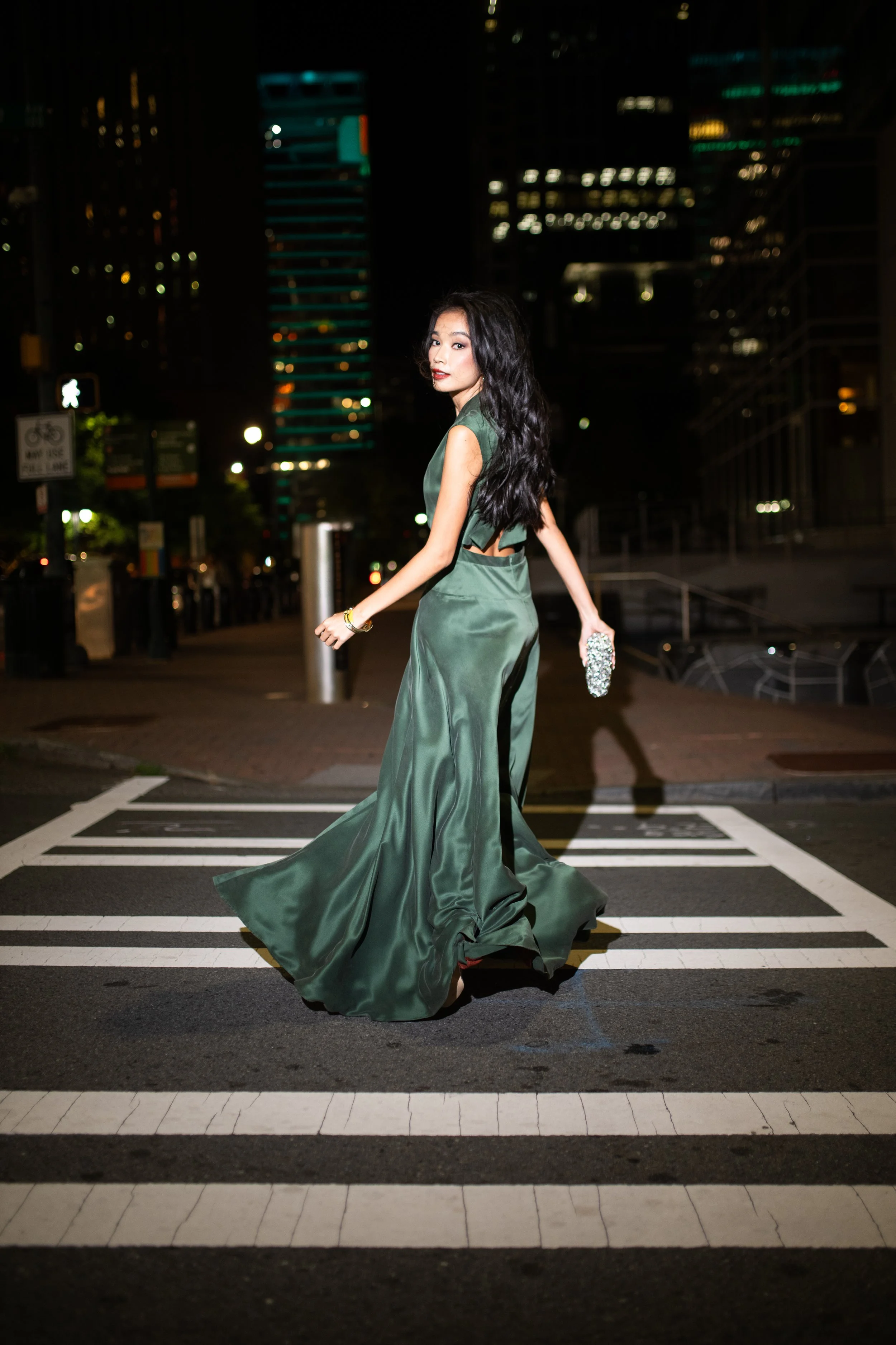 Daniel Gonzalez designed a stunning green gown that flows perfectly for evening events, photographed by top Charlotte photographer, Amanda Anderson