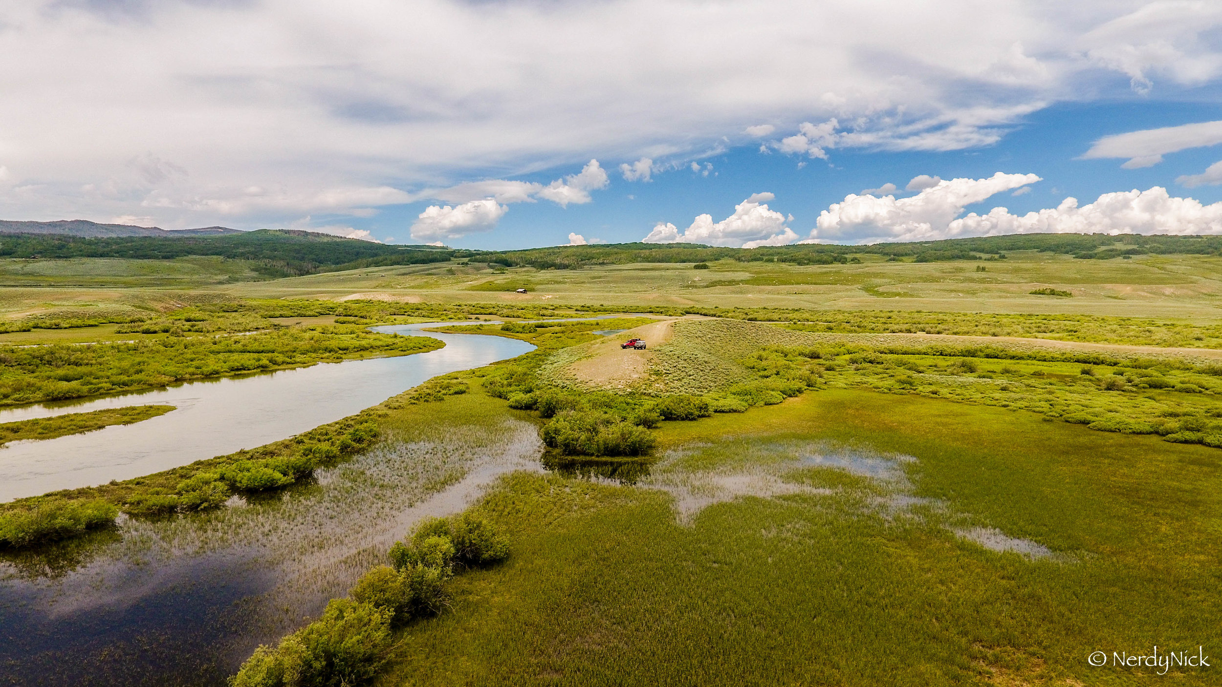 Enjoying all the water and bright green grasses along the Green River