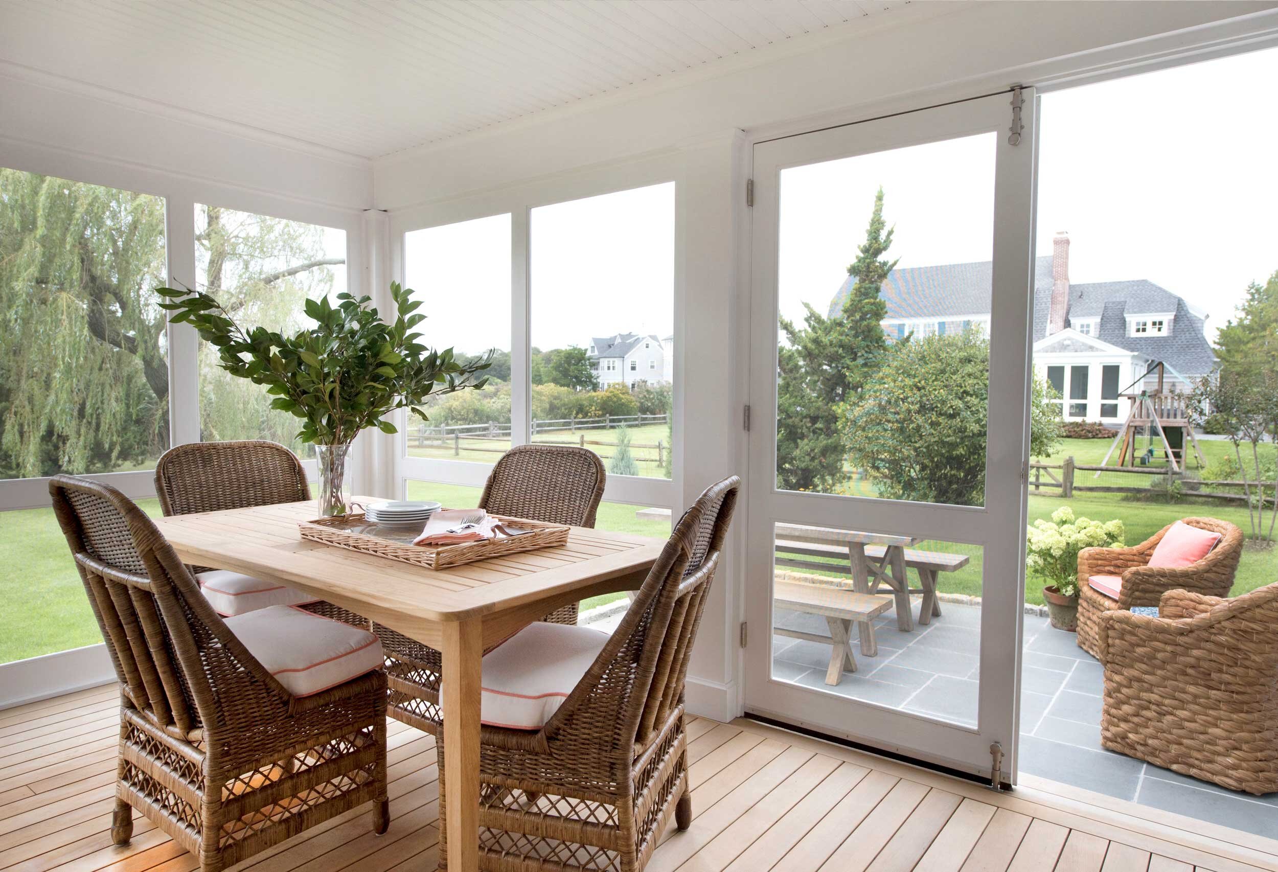 17-Lawrence-porch-dining2-Elizabeth-Cooper-Interiors.jpg