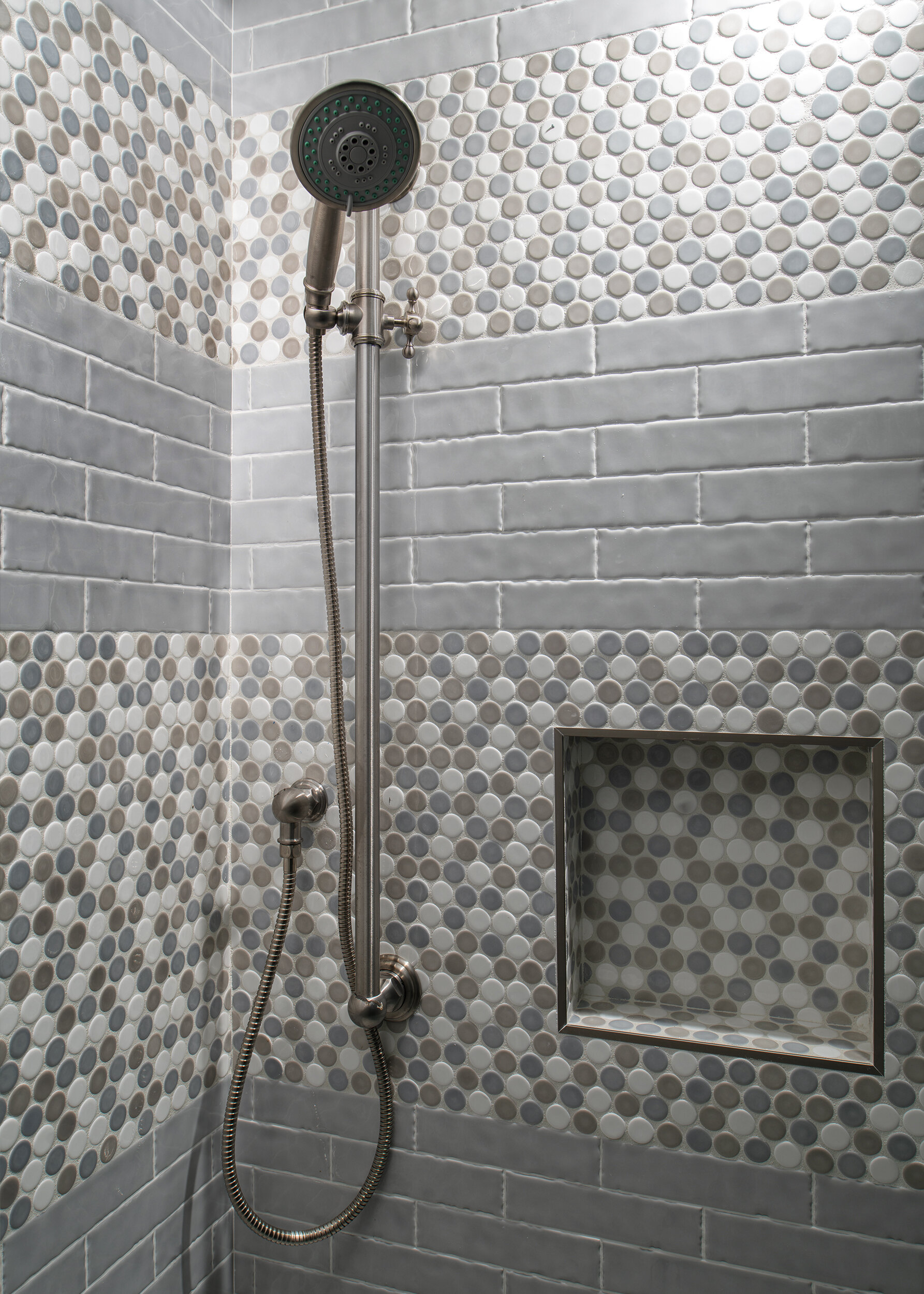 Grey mixed tile shower 