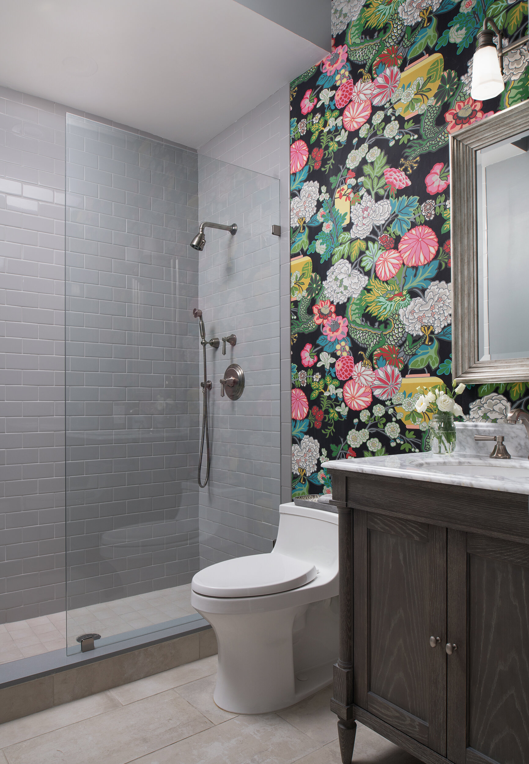 bold floral print wallpaper bathroom with marble sink