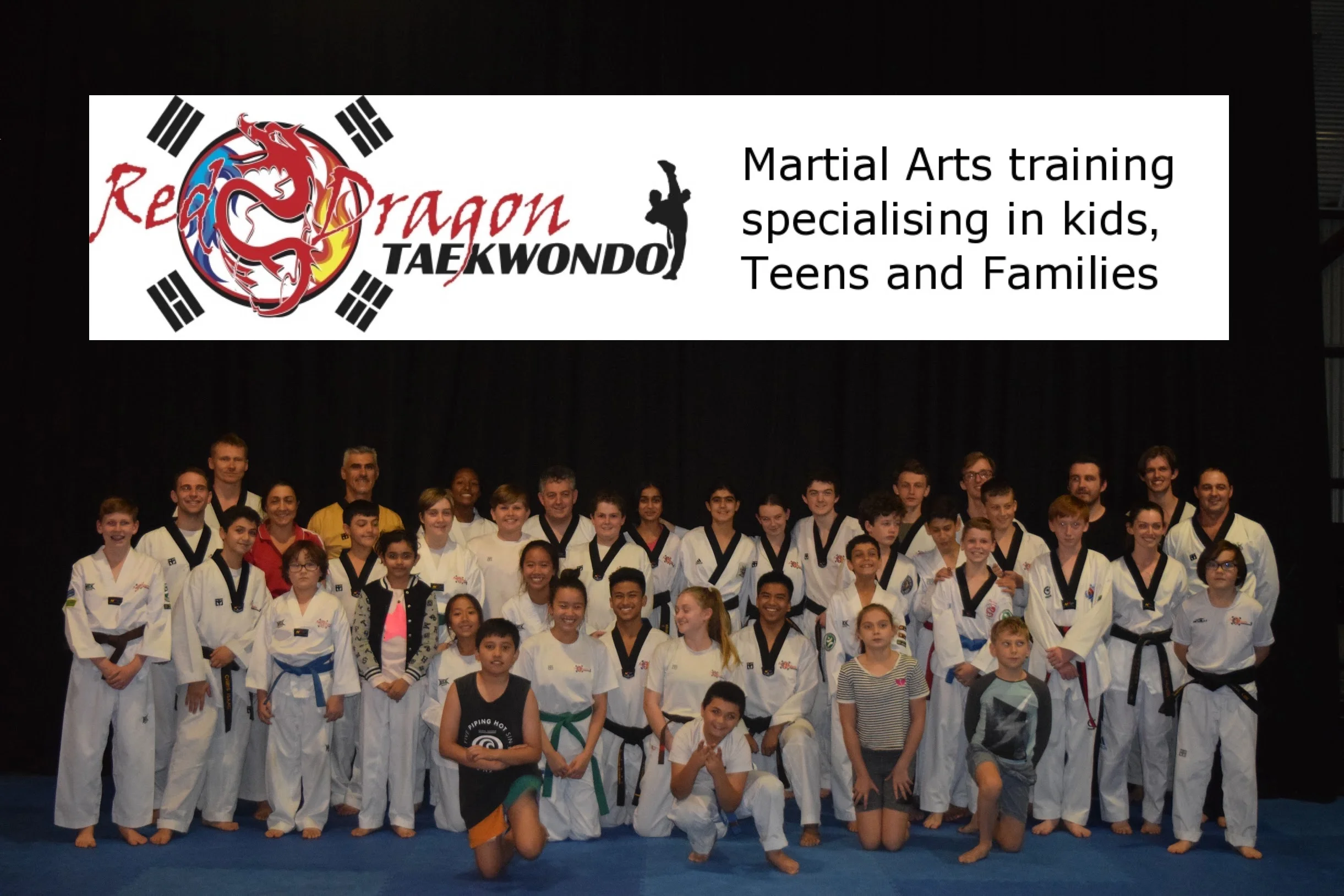 Group Shot with Logo.jpg