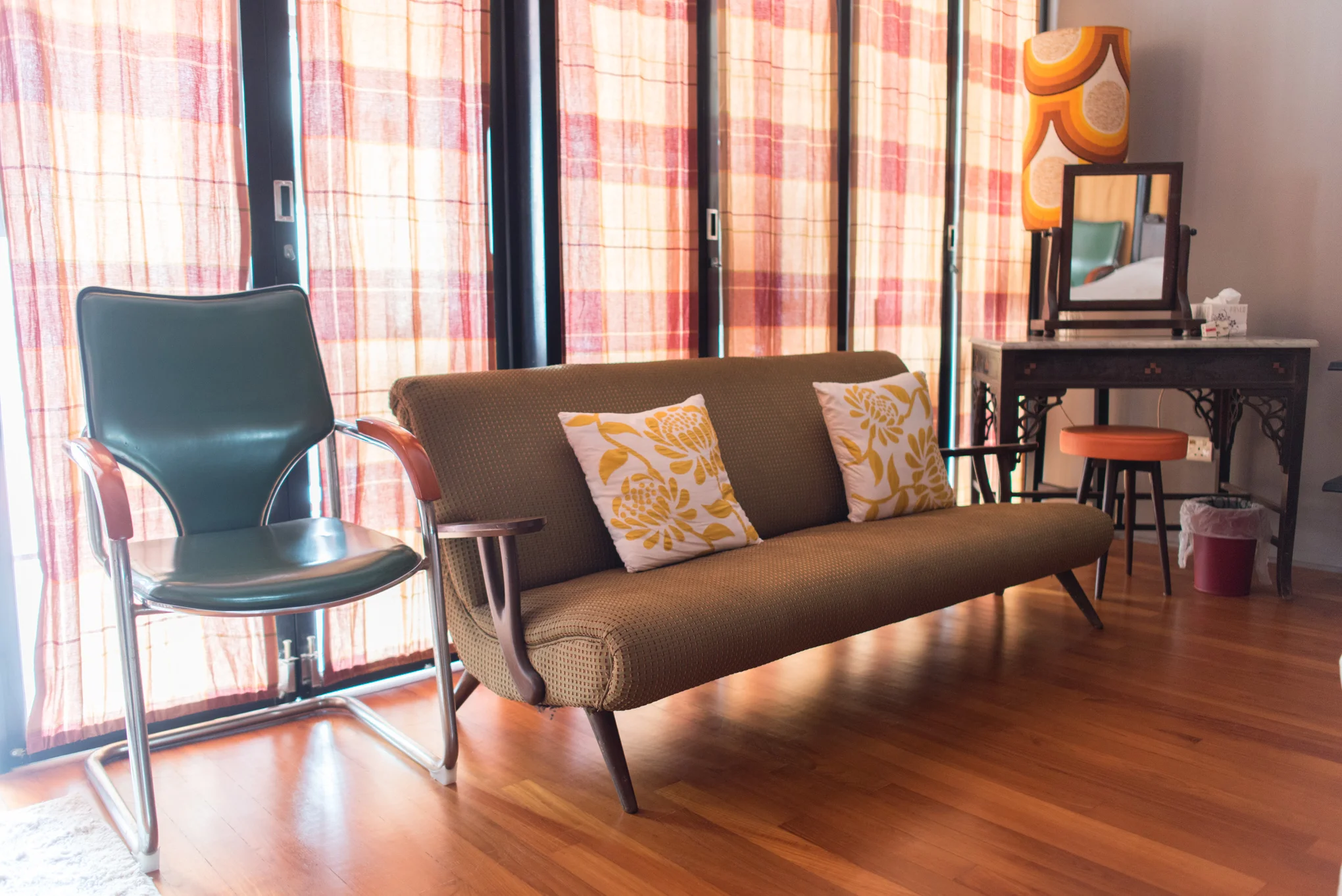 Pictured above: Original solid wood 1970s vintage furniture. Kheng Hua adopted these from her grandmother, and had them stylishly reupholstered.