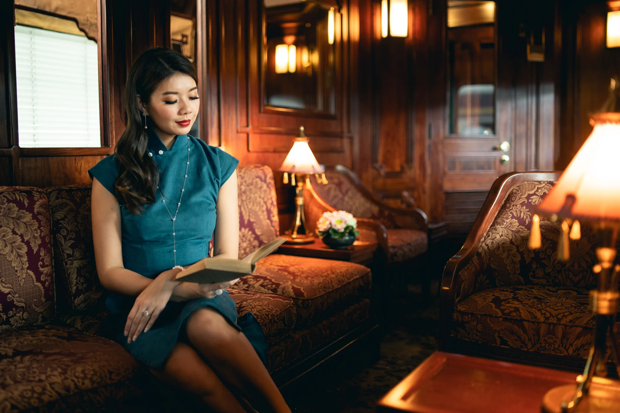 The Reading Room, ornately decorated with plush furnishings, provides an intimate setting for a quiet read.