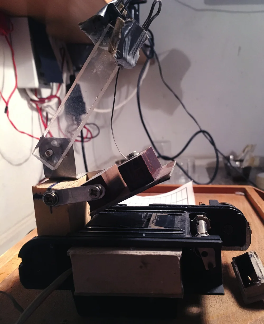  …adapted from soviet camera parts, plexiglass, cardboard… 