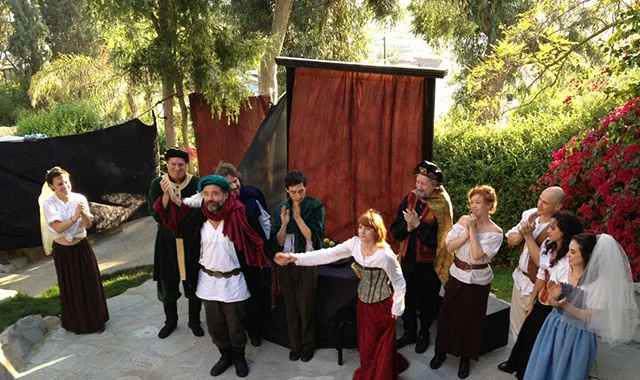 Actors taking a bow following a performance of "The Taming of the Shrew"