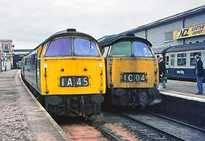 October 4, 1975, the last day for some Westerns, sees a troubled D1021 on the 1A45 12.20 Penzance-Paddington from Plymouth which had failed at Exeter - D1041 worked forward. D1021 had failed at Totnes and had lost main air pressure with ‘A’ engine s…