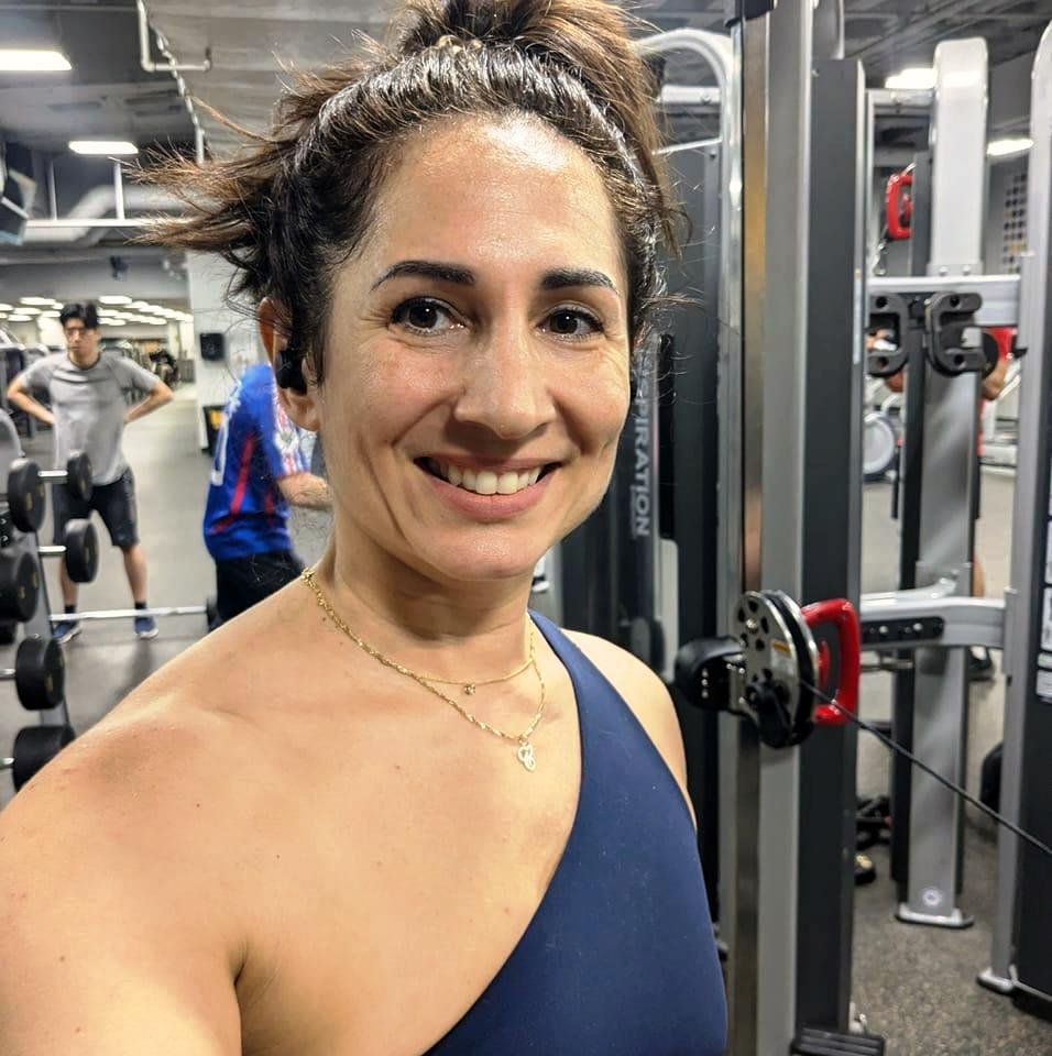 Zeina Raya at the gym, reflecting her passion for strength training, fitness, and physical activity.