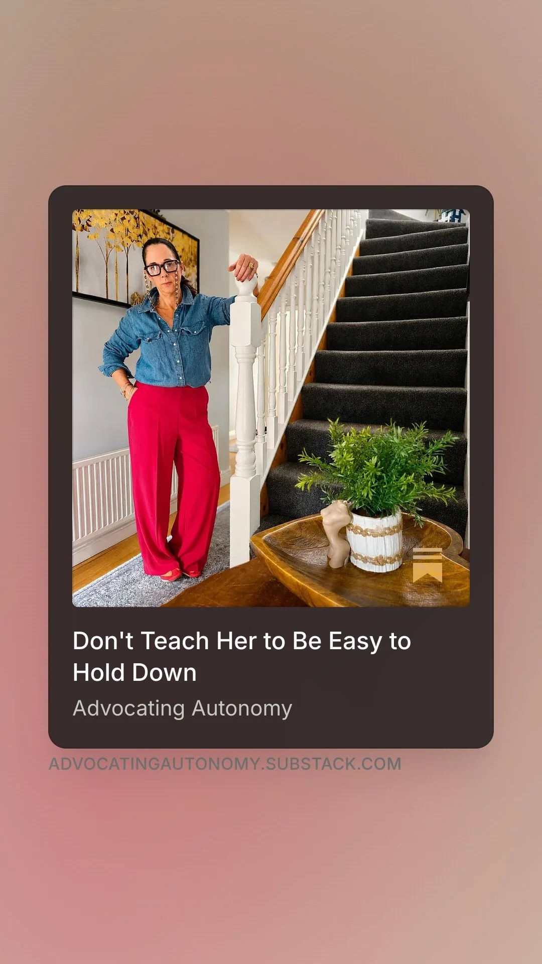 Article cover for “Don’t Teach Her to Be Easy to Hold Down” by Pauline Harley, showing the author standing beside a staircase.