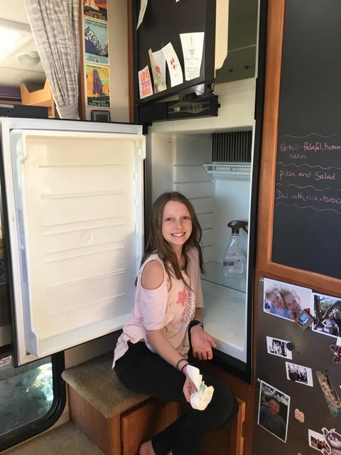 It was all-hands-on-deck for cleaning and unpacking the rig. Here’s Ellie cleaning out the fridge