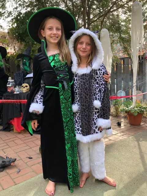 Our little ladies trying out their costumes