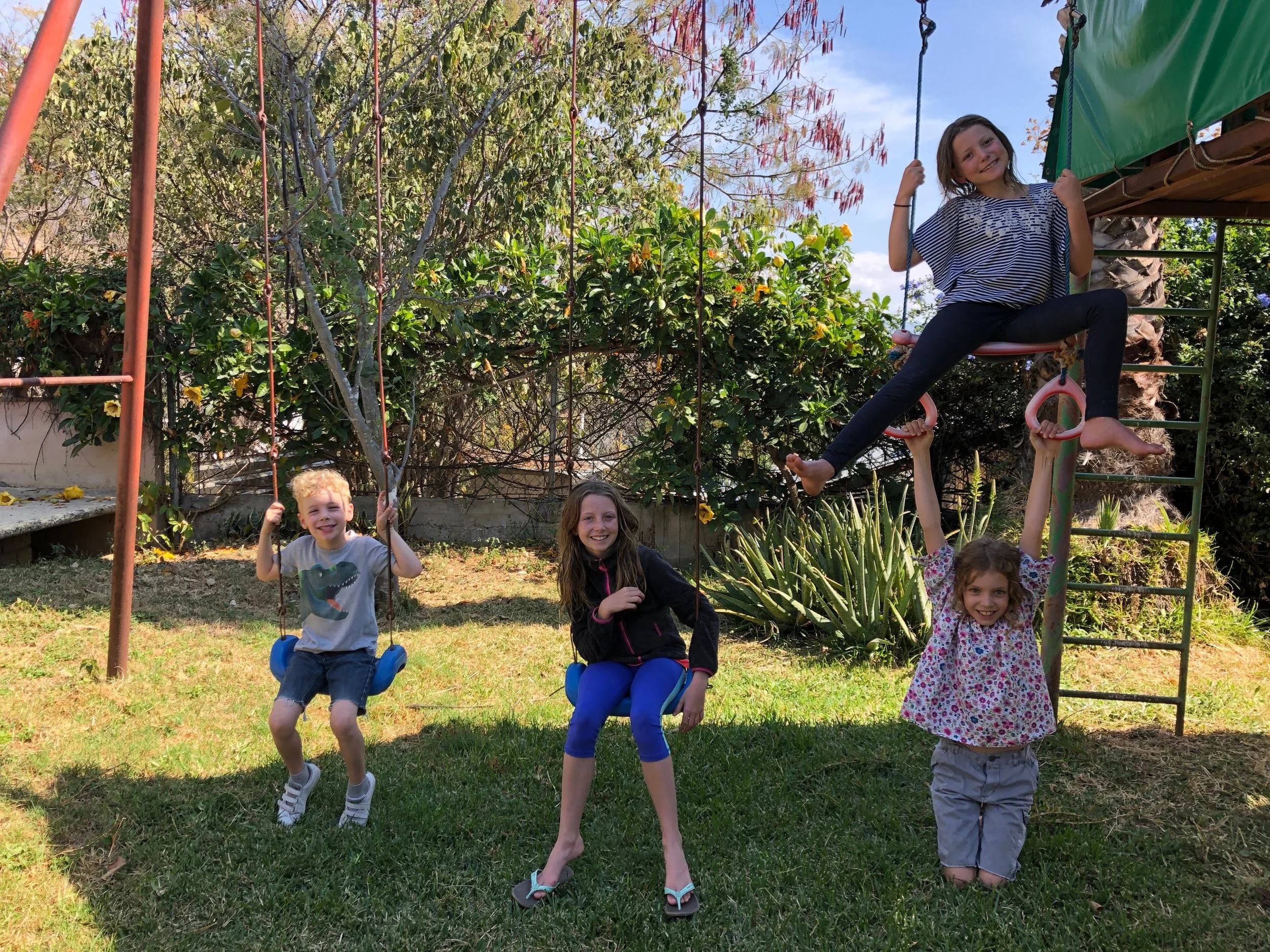 Louis, Ellie, Harlie and Isla on the play structure at our house in San Felipe del Agua