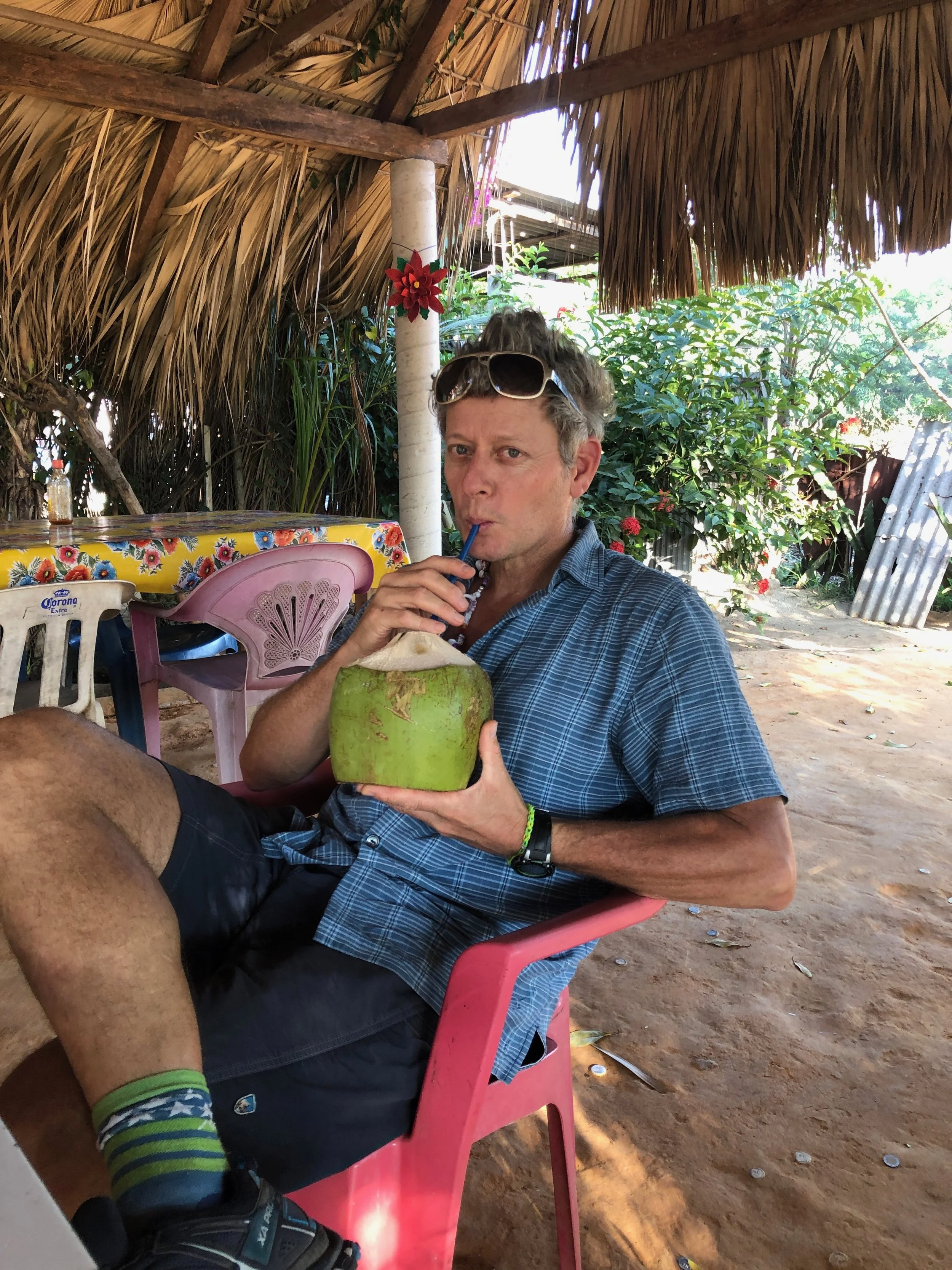 John sipping a coco frio (cold coconut water). We stopped to stretch our legs and get a refreshing drink once we hit the main highway. These cocos may have been the best of the whole trip!