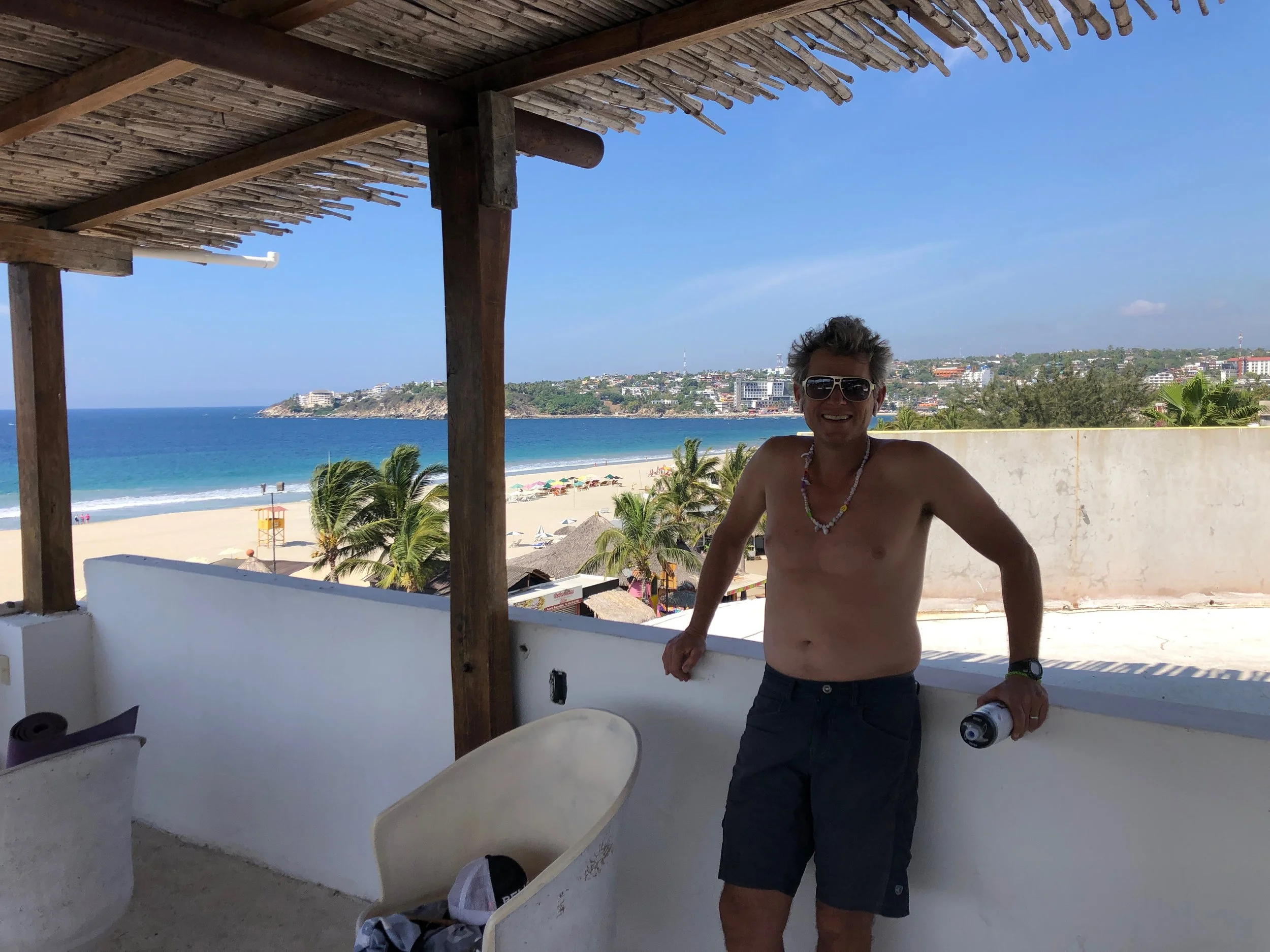 John and the view from the rooftop deck of our hotel