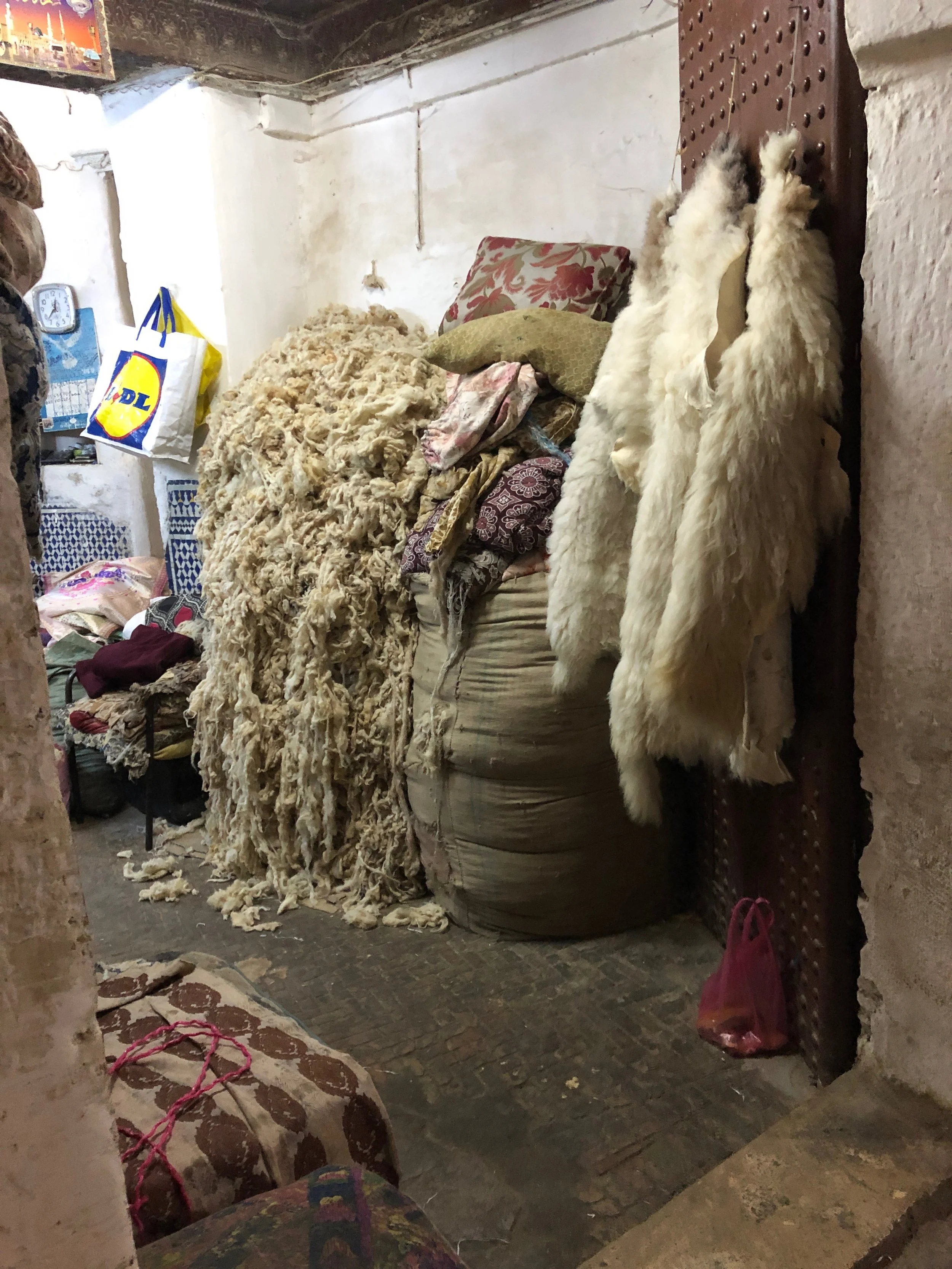 Clumps of wool and sheep skins
