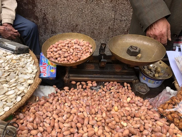 Buying salted peanuts - we couldn’t get enough of these peanuts - I loved the scale!