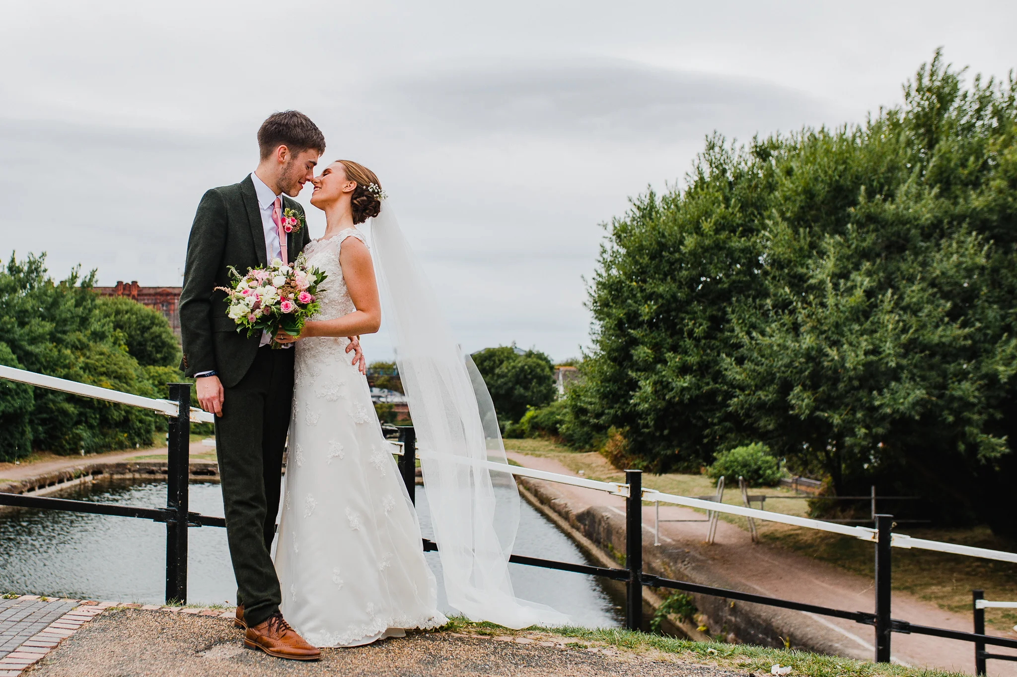 Jess and Ben - Liverpool wedding - bride and groom kissing