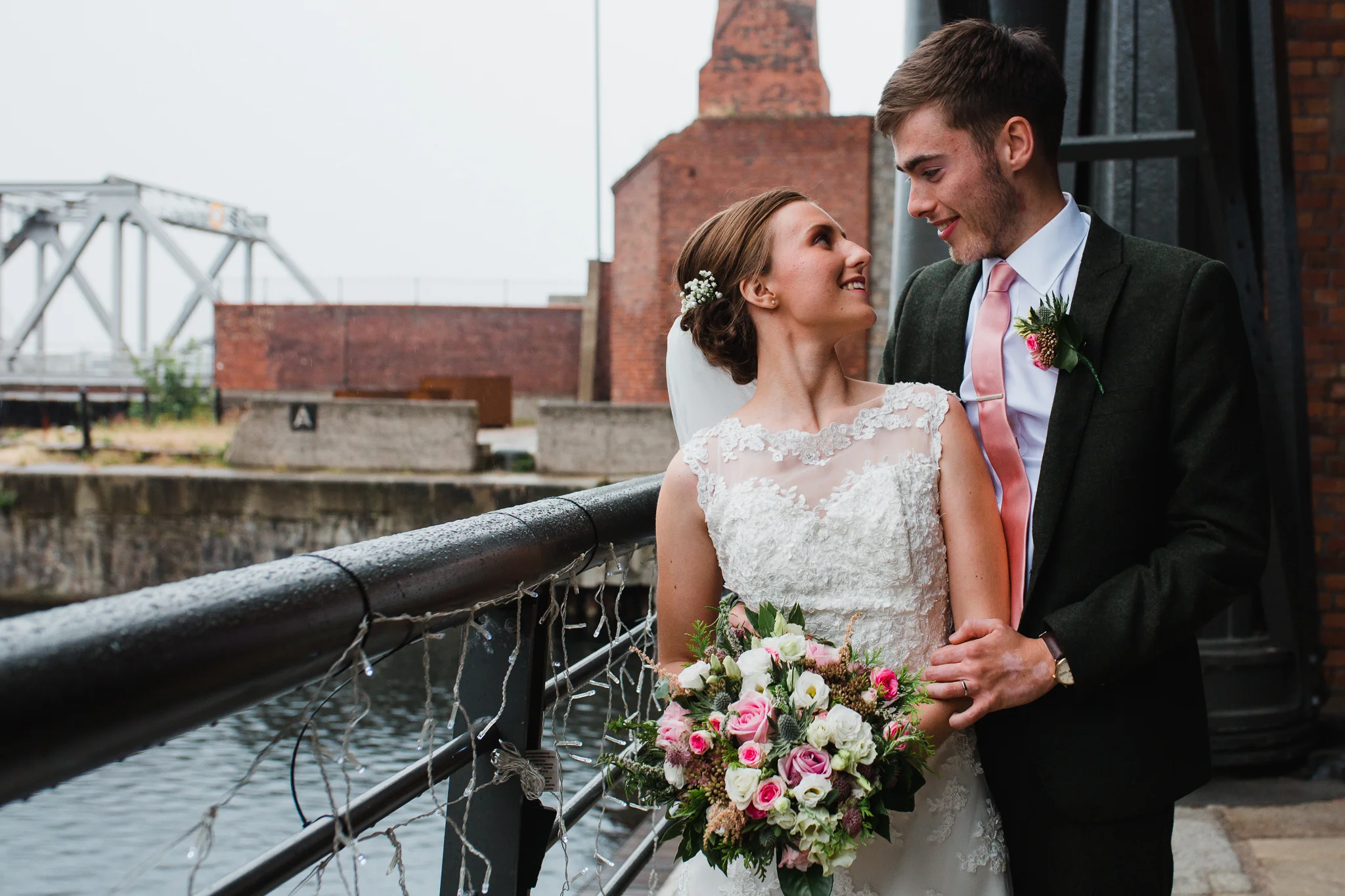 Jess and Ben - Liverpool wedding - bride and groom on the balcony