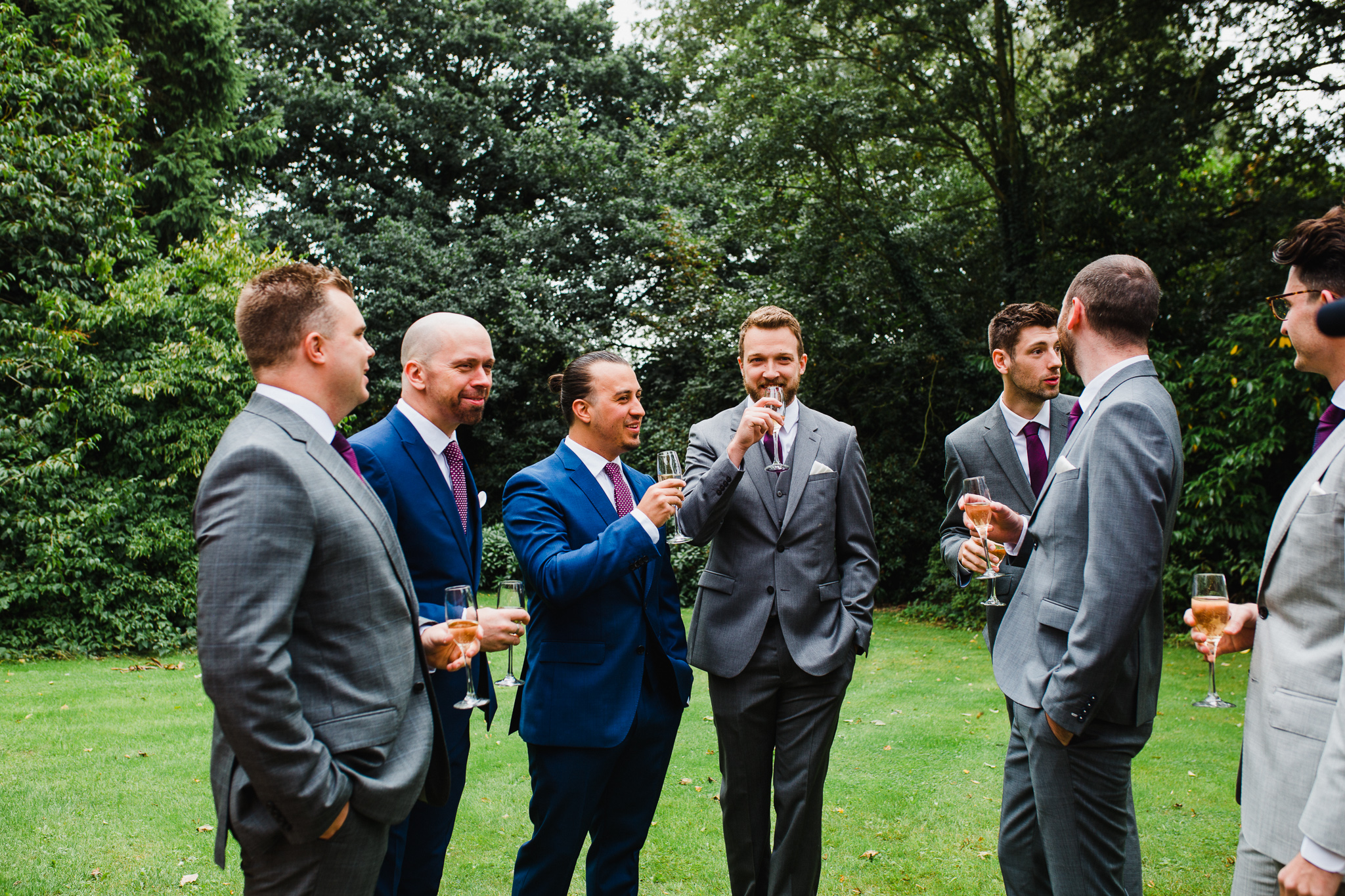 groom and groomsmen in the garden