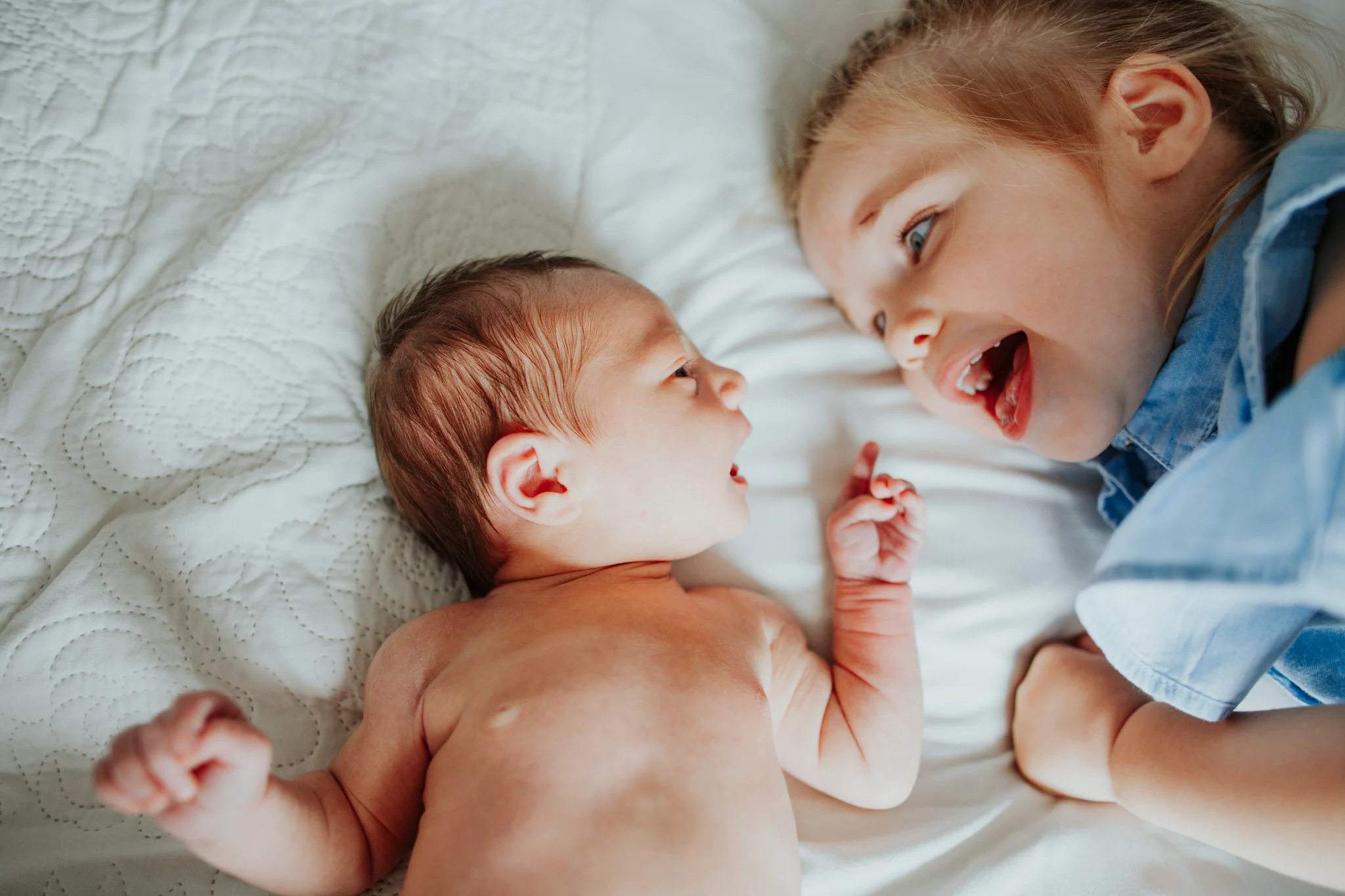 Sisters smiling at each other