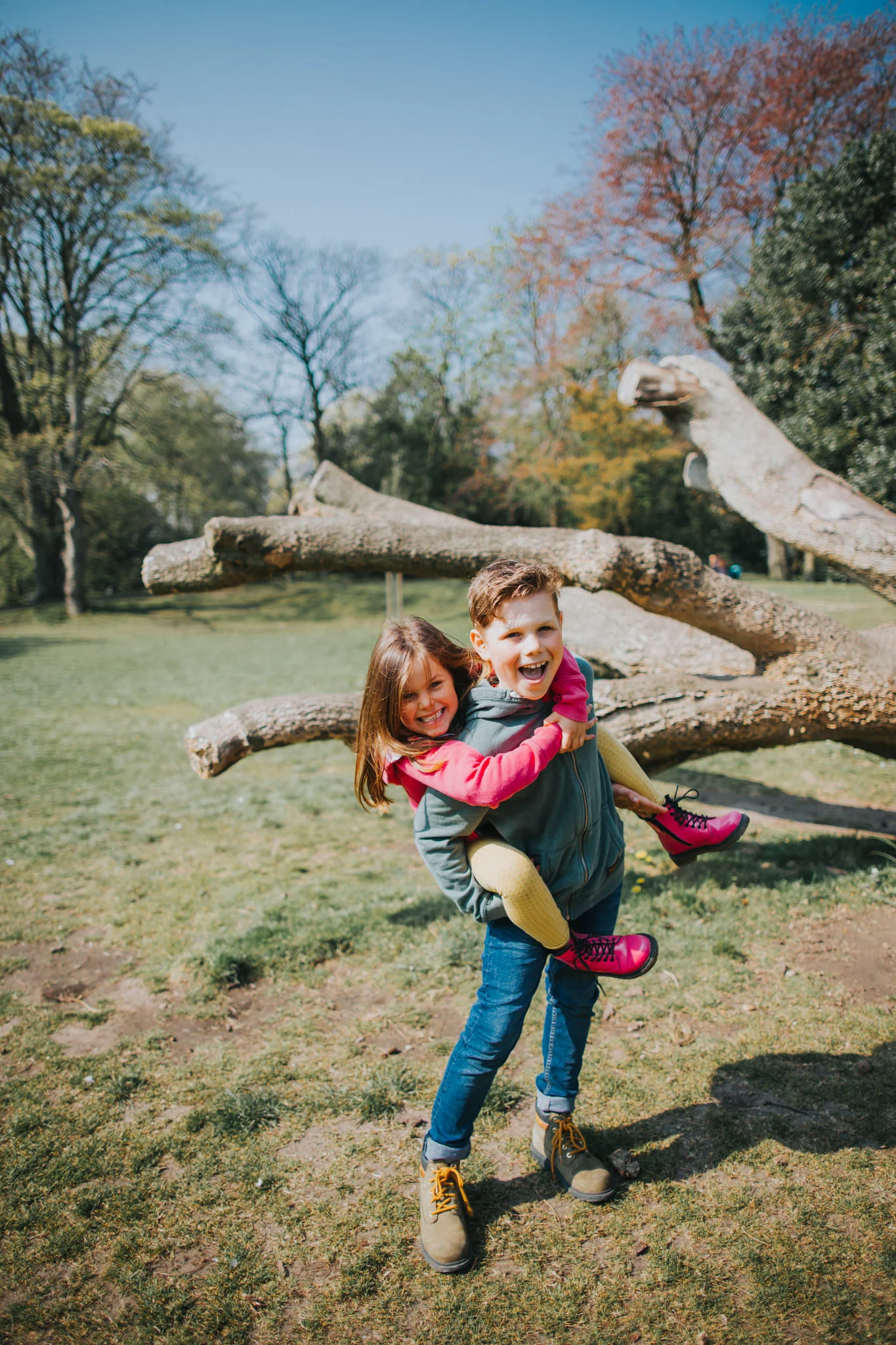 Brother and Sister playing in the park
