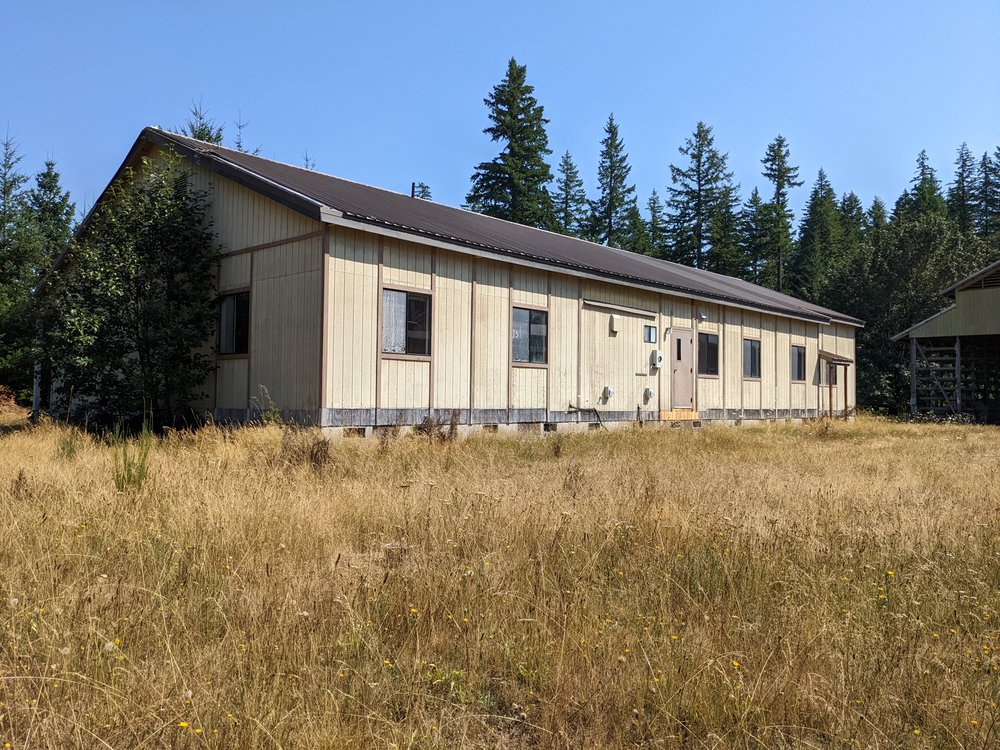 Main entry will be close to center of building, where porch and ramp and landscaping will make for a comfy landing spot for busy families in the mornings.