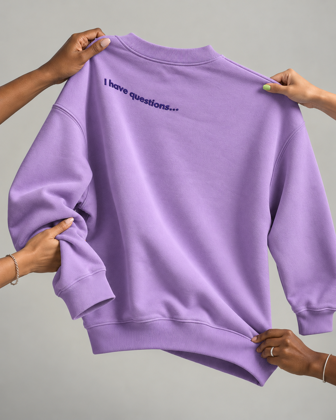 Lavender Sweatshirt with Embroidered Questions.png