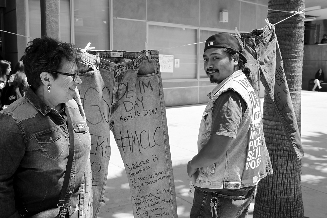  Denim Clothesline with POV Executive Director, Patti Giggans and Youth Educator, Anthony Lopez 