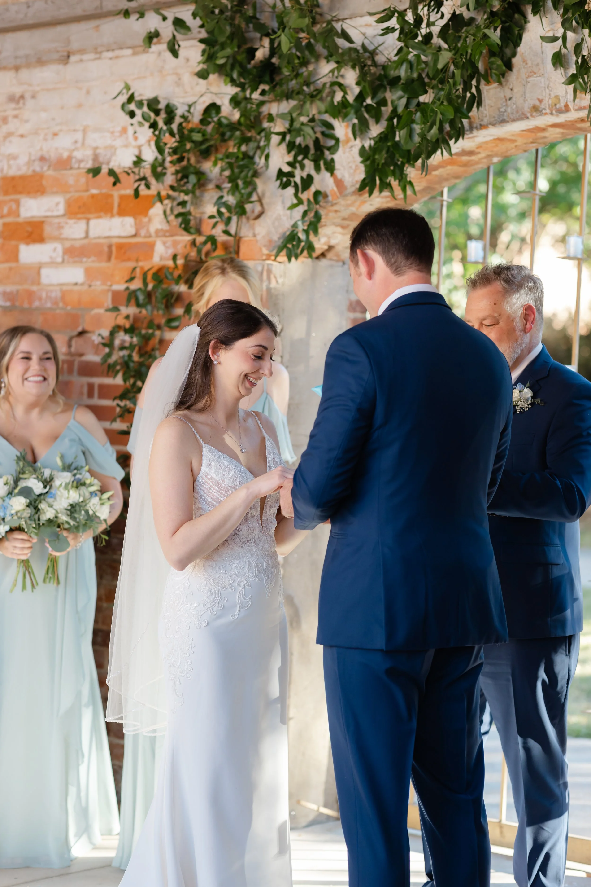 bride and groom getting married at enterprise mills events center in augusta ga