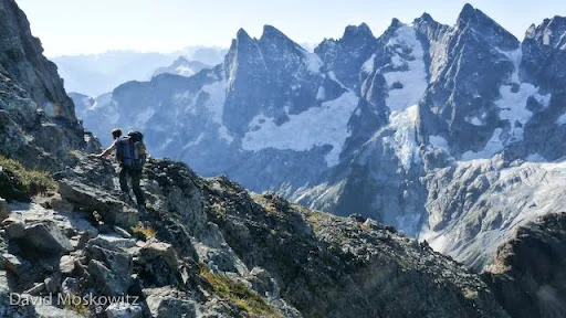 Forest McBrian traversing south along the ridge leading to Picket Pass, what Fred Beckey might refer to as “pleasant hiking”.