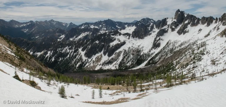 Looking down into the upper stretch of Cedar Creek and towards the peaks of the northern Sawtooth range on the eastern edge of the North Cascades, Washington.