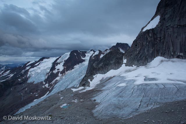 This beautiful mountain range is quickly changing–not from the climbers that flock to the area but climate change. Glaciers in this part of the Purcell Mountains are in fast retreat due to climate change, apparent here from the vast stretches of bare glacial ice and the very thin remaining snow cover of much of the rest of them. The Crescent glacier, in the foreground, no longer has an accumulation zone and it is only a matter of time before the ice which remains disappears completely. Learn more about climate change at 350.org .
