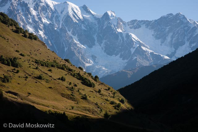 Hay mounds dotted hillsides up and down the mountainsides across much of Sveneti during the fall. Caucasus Mountains, Republic of Georgia.