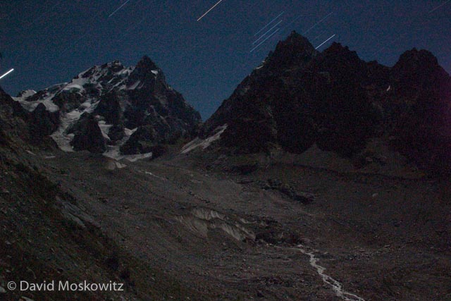 Mount Ushba (left), neighboring Mazerie Peak, and the massive rock covered lower portion of the Ushba Glacier photographed via moon and starlight.