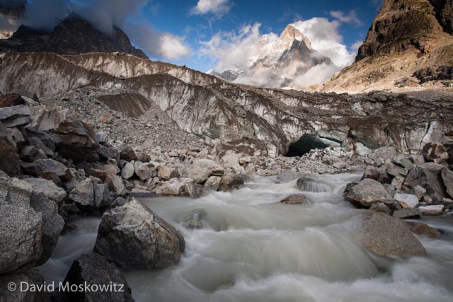 Murky waters pour out of the snout of the Ushba Glacier, one of the headwaters of the Inguri River, one of the largest and economically most important river in Georgia.
