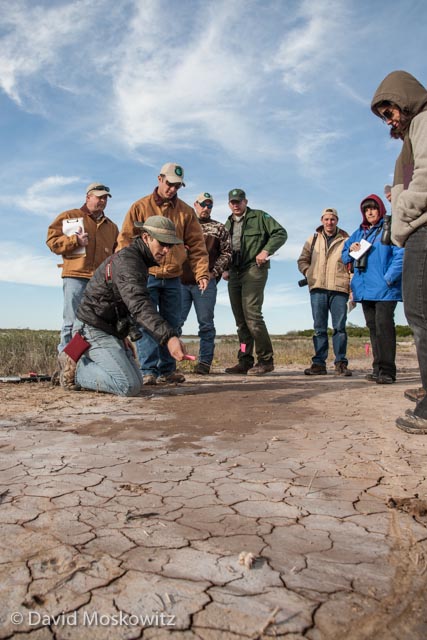 Track and Sign Evaluator and Texas Parks and Wildlife Biologist Jonah Evans leads a discussion about the tracks left by several coyotes traveling on the shore of Laguna Atascosa in southern Texas.