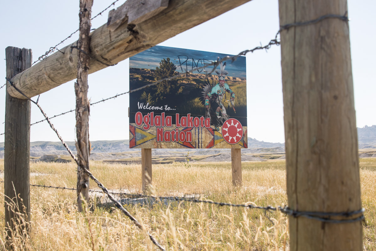 All Nations Gathering Center, founded by Dallas and Becky Chief Eagle, is within the Pine Ridge Reservation in South Dakota. While the majority of the Lakota Nation’s traditional territory no longer belongs to them, reservations such as Pine Ridge remain sovereign land of an independent nation within the United States. To the west of Pine Ridge, ownership of the Black Hills remains disputed. Taken without treaty or permission by the United States when gold was discovered there in the 1800’s, the US Government offered payment for them in the 1980’s. The Lakota have never accepted this payment. They continue to state that, despite the fact that the United States holds de facto ownership of them, the Black Hills were not and are not for sale.