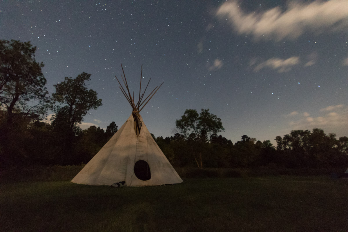 Moonlight on a teepee at All Nations.