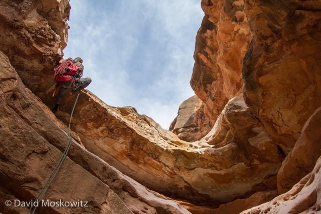  A tricky rappell for canyoneer Ryan Audett in Cove Canyon, which feeds into the Colorado River in the Grand Canyon, Arizona. 